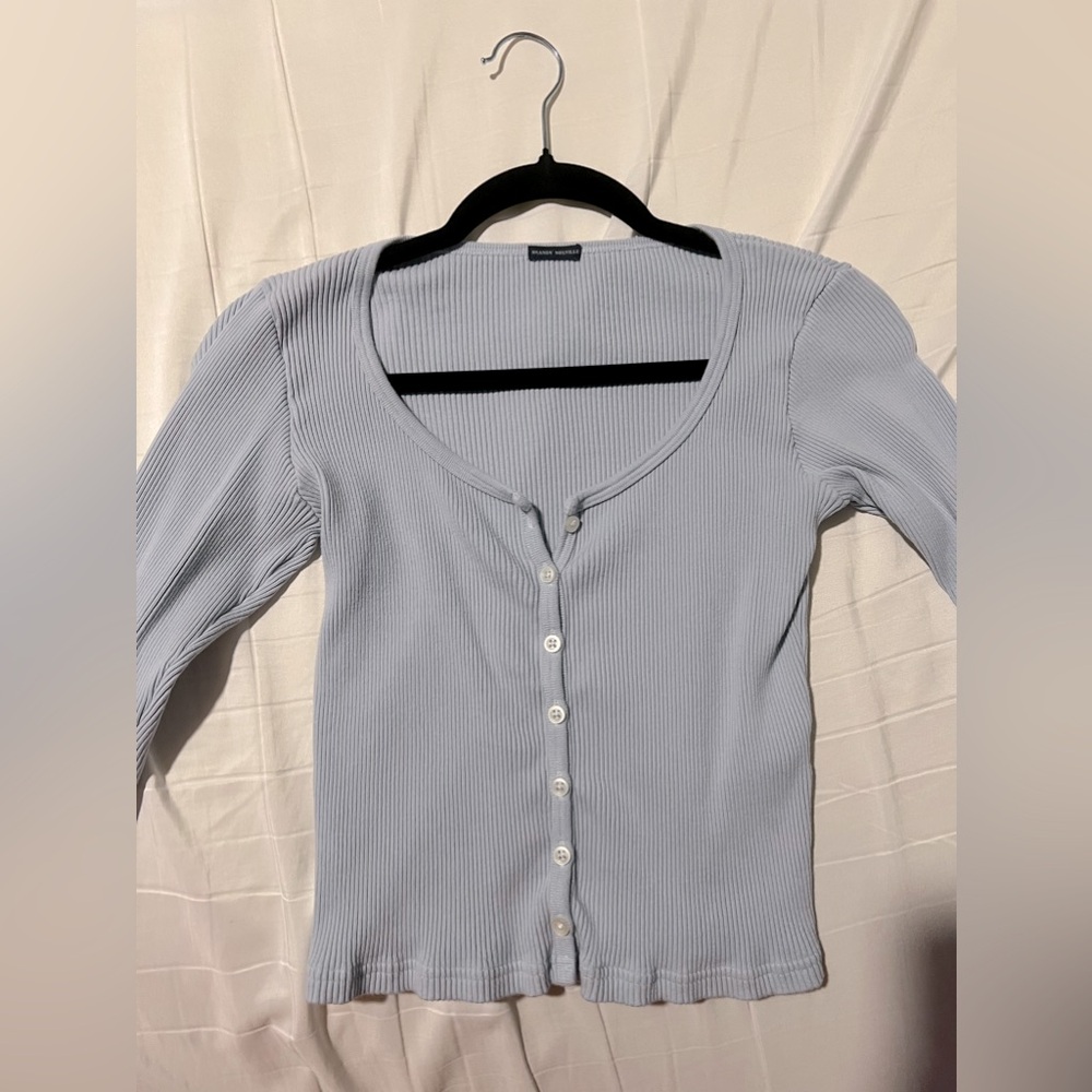 Long Sleeve Brandy T-Shirt w/ Buttons all the way down.
